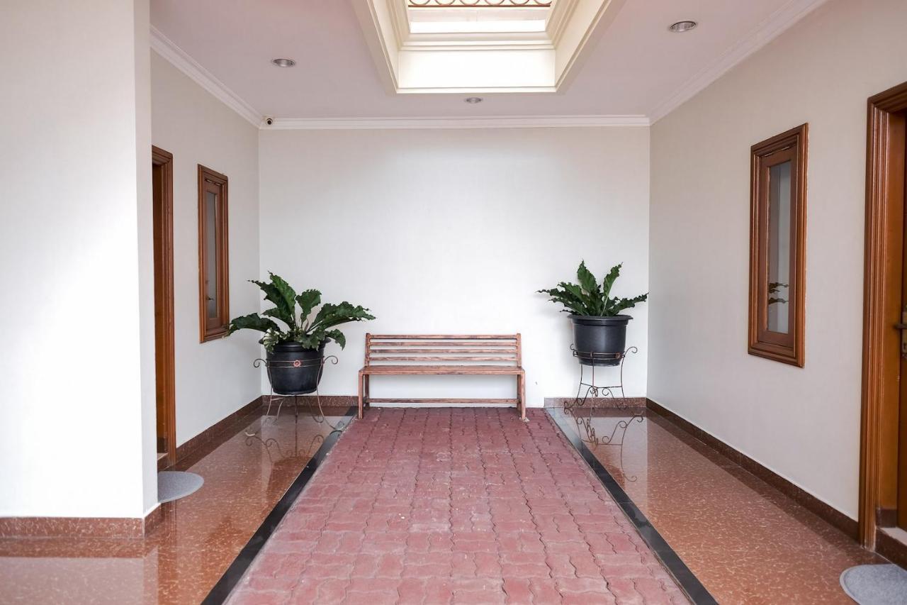 Wisma Delapan Mitra Reddoorz جاكرتا المظهر الخارجي الصورة